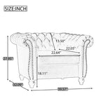 Poltrona Chesterfield Club con braccioli arrotolati, borchie e gambe in legno massello