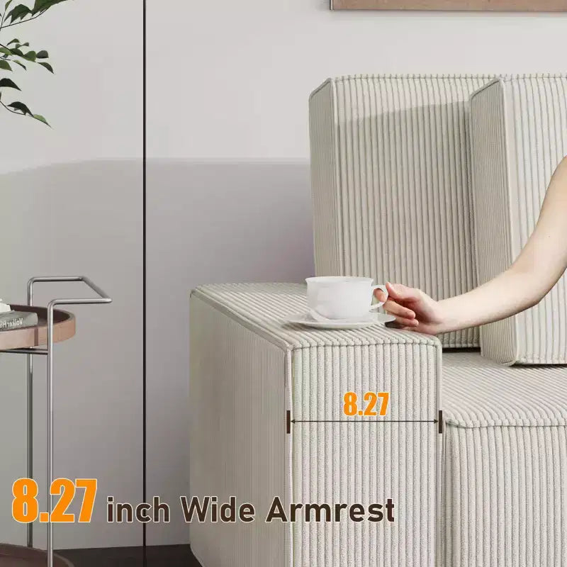 Divano sezionale a L in velluto a coste con pouf mobile